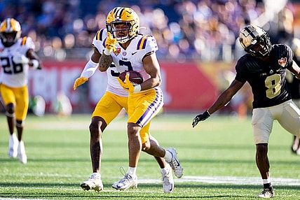 Jan 2, 2023; Orlando, FL, USA; LSU Tigers safety Greg Brooks Jr. (3) gestures after an interception during the second half against the Purdue Boilermakers at Camping World Stadium. Mandatory Credit: Matt Pendleton-USA TODAY Sports