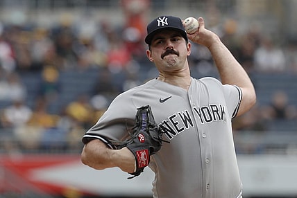 Sep 17, 2023; Pittsburgh, Pennsylvania, USA; New York Yankees starting pitcher Carlos Rodon (55) throws a pitch against the Pittsburgh Pirates during the first inning at PNC Park. Mandatory Credit: Charles LeClaire-USA TODAY Sports