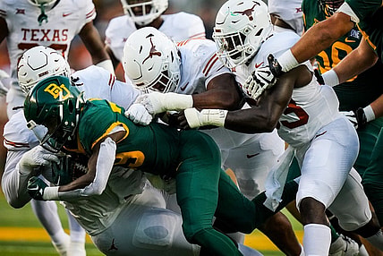 The Texas Longhorns defense stop DUPLICATE***Baylor running back Richard Reese (29) from advancing in the first quarter of the game, Saturday, Sept. 23 at McLane Stadium in Waco.