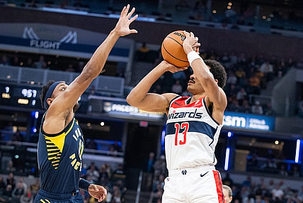 Oct 25, 2023; Indianapolis, Indiana, USA; Washington Wizards guard Jordan Poole (13) shoots the ball while Indiana Pacers guard Bennedict Mathurin (00) defends in the first quarter at Gainbridge Fieldhouse. Mandatory Credit: Trevor Ruszkowski-USA TODAY Sports