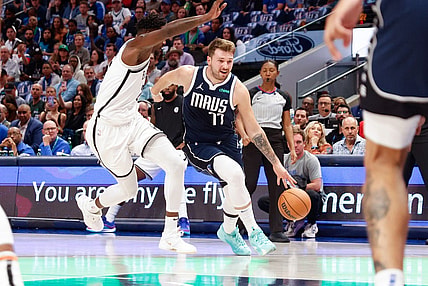 Oct 27, 2023; Dallas, Texas, USA; Dallas Mavericks guard Luka Doncic (77) drives on Brooklyn Nets forward Dorian Finney-Smith (28) during the second quarter at American Airlines Center. Mandatory Credit: Andrew Dieb-USA TODAY Sports