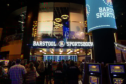People line up in front of Barstool Sportsbook within Hollywood Casino at Kansas Speedway before the official start of legal sports betting on Sept. 1, 2022.