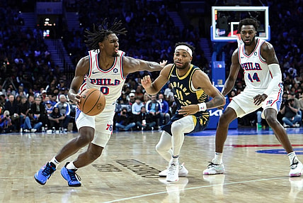 Nov 12, 2023; Philadelphia, Pennsylvania, USA; Philadelphia 76ers guard Tyrese Maxey (0) drives to the basket against Indiana Pacers forward Bruce Brown (11) during the fourth quarter at Wells Fargo Center. Mandatory Credit:  John Jones-USA TODAY Sports