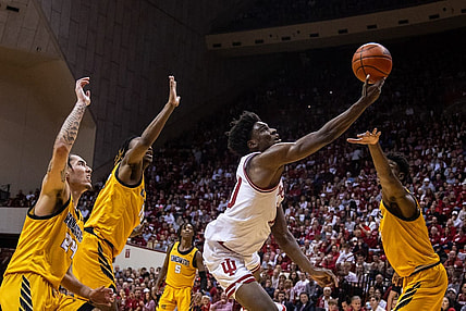 Dec 29, 2023; Bloomington, Indiana, USA; Indiana Hoosiers forward Kaleb Banks (10) shoots the ball while Kennesaw State Owls defend in the first half at Simon Skjodt Assembly Hall. Mandatory Credit: Trevor Ruszkowski-USA TODAY Sports