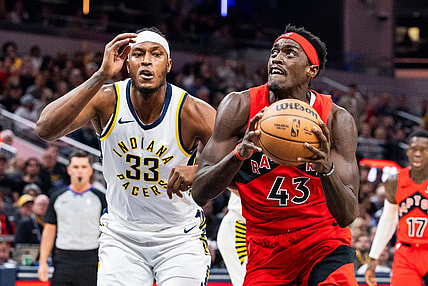 Nov 22, 2023; Indianapolis, Indiana, USA; Toronto Raptors forward Pascal Siakam (43) shoots the ball while Indiana Pacers center Myles Turner (33) defends in the first quarter at Gainbridge Fieldhouse. Mandatory Credit: Trevor Ruszkowski-USA TODAY Sports