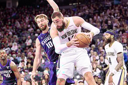 Jan 7, 2024; Sacramento, California, USA; New Orleans Pelicans center Jonas Valanciunas (17) grabs a rebound against Sacramento Kings forward Domantas Sabonis (10) during the second quarter at Golden 1 Center. Mandatory Credit: Ed Szczepanski-USA TODAY Sports