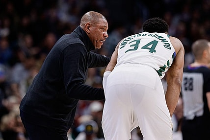 Jan 29, 2024; Denver, Colorado, USA; Milwaukee Bucks head coach Doc Rivers talks with forward Giannis Antetokounmpo (34) in the fourth quarter against the Denver Nuggets at Ball Arena. Mandatory Credit: Isaiah J. Downing-USA TODAY Sports