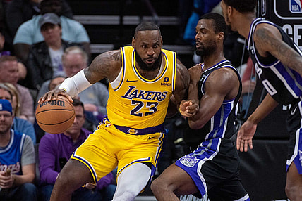 Mar 13, 2024; Sacramento, California, USA; Sacramento Kings forward Harrison Barnes (40) defends against Los Angeles Lakers forward LeBron James (23) during the fourth quarter at Golden 1 Center. Mandatory Credit: Ed Szczepanski-USA TODAY Sports