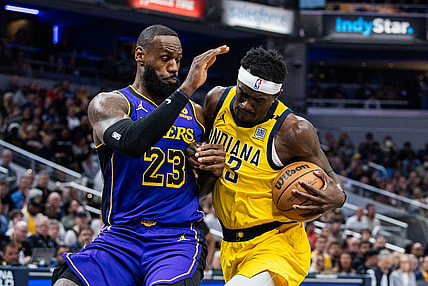 Mar 29, 2024; Indianapolis, Indiana, USA; Indiana Pacers forward Pascal Siakam (43) shoots the ball while Los Angeles Lakers forward LeBron James (23) defends in the first half at Gainbridge Fieldhouse. Mandatory Credit: Trevor Ruszkowski-USA TODAY Sports