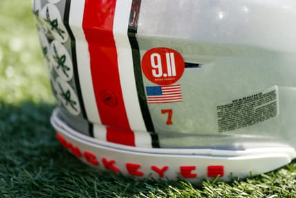 A 9/11 sticker is on the back of Ohio State Buckeyes quarterback C.J. Stroud's helmet prior to the NCAA football game against the Oregon Ducks at Ohio Stadium in Columbus on Saturday, Sept. 11, 2021.

Oregon Ducks At Ohio State Buckeyes Football