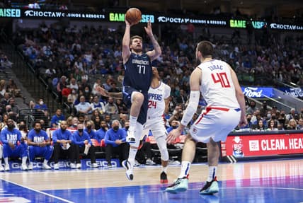 Feb 10, 2022; Dallas, Texas, USA;  Dallas Mavericks guard Luka Doncic (77) shoots over LA Clippers center Ivica Zubac (40) during the second half at American Airlines Center. Mandatory Credit: Kevin Jairaj-USA TODAY Sports