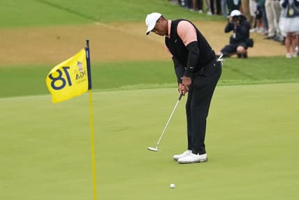 May 21, 2022; Tulsa, OK, USA; Tiger Woods puts on the 18th green during the third round of the PGA Championship golf tournament at Southern Hills Country Club. Mandatory Credit: Michael Madrid-USA TODAY Sports