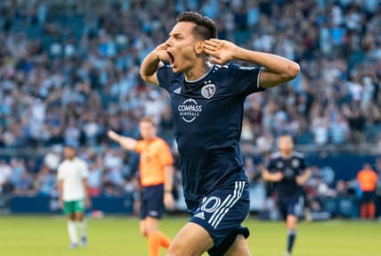May 18, 2022; Kansas City, Kansas, USA; Sporting Kansas City forward Daniel Salloi (20) celebrates after scoring a goal against the Colorado Rapids during the first half at Children's Mercy Park. Mandatory Credit: Jay Biggerstaff-USA TODAY Sports