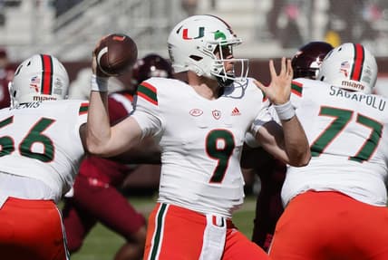 Oct 15, 2022; Blacksburg, Virginia, USA;  Miami Hurricanes quarterback Tyler Van Dyke (9) throws a pass as offensive linemen Logan Sagapolu (77) and Jonathan Denis (56) block during the first quarter against the Virginia Tech Hokies at Lane Stadium. Mandatory Credit: Reinhold Matay-USA TODAY Sports