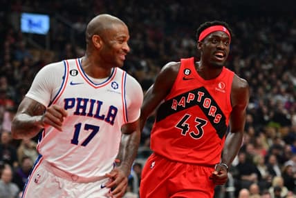 Oct 26, 2022; Toronto, Ontario, CAN; Toronto Raptors forward Pascal Siakam (43) talks to Philadelphia 76ers forward P.J. Tucker (17) after making a basket in the first half at Scotiabank Arena. Mandatory Credit: Dan Hamilton-USA TODAY Sports