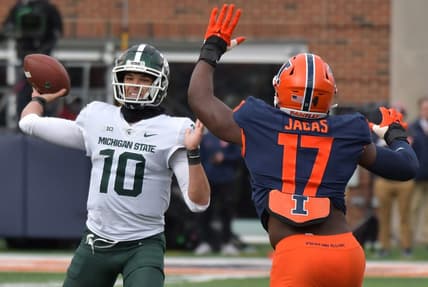 Nov 5, 2022; Champaign, Illinois, USA;  Michigan State Spartans quarterback Payton Thorne (10) passes the ball as Illinois Fighting Illini linebacker Gabe Jacas (17) pressures during the first half at Memorial Stadium. Mandatory Credit: Ron Johnson-USA TODAY Sports