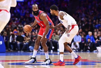 Dec 23, 2022; Philadelphia, Pennsylvania, USA; Philadelphia 76ers guard James Harden (1) shields the ball from Los Angeles Clippers forward Paul George (13) in the first quarter at Wells Fargo Center. Mandatory Credit: Kyle Ross-USA TODAY Sports