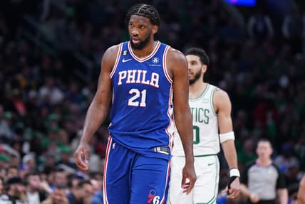 Feb 8, 2023; Boston, Massachusetts, USA; Philadelphia 76ers center Joel Embiid (21) and Boston Celtics forward Jayson Tatum (0) return up court in the second half at TD Garden. Mandatory Credit: David Butler II-USA TODAY Sports