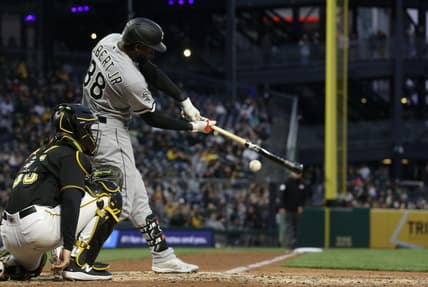 Apr 8, 2023; Pittsburgh, Pennsylvania, USA;  Chicago White Sox center fielder Luis Robert Jr. (88) hits a double down the left field line against the Pittsburgh Pirates during the fourth inning at PNC Park. Mandatory Credit: Charles LeClaire-USA TODAY Sports