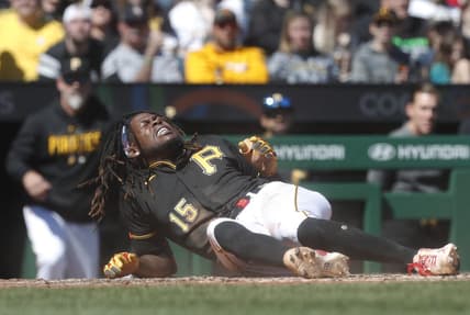 Apr 9, 2023; Pittsburgh, Pennsylvania, USA; Pittsburgh Pirates shortstop Oneil Cruz (15) reacts after collision at home plate against the Chicago White Sox during the sixth inning at PNC Park. Cruz would exit the game. Mandatory Credit: Charles LeClaire-USA TODAY Sports