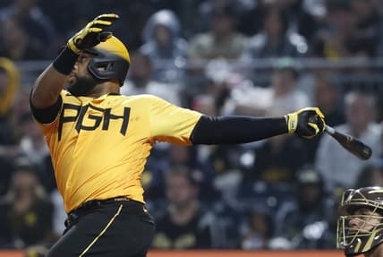 Jun 27, 2023; Pittsburgh, Pennsylvania, USA;  Pittsburgh Pirates first baseman Carlos Santana (41) hits a RBI single against the San Diego Padres during the sixth inning at PNC Park. Mandatory Credit: Charles LeClaire-USA TODAY Sports