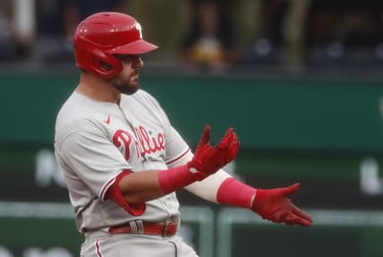 Jul 28, 2023; Pittsburgh, Pennsylvania, USA;  Philadelphia Phillies designated hitter Kyle Schwarber (12) reacts at second base after hitting a double against the Pittsburgh Pirates during the first inning at PNC Park. Mandatory Credit: Charles LeClaire-USA TODAY Sports