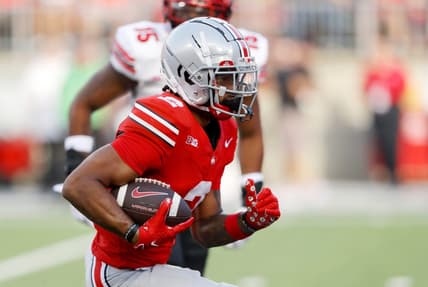 Sep 16, 2023; Columbus, Ohio, USA; Ohio State Buckeyes wide receiver Emeka Egbuka (2) runs for a touchdown during the second quarter against the Western Kentucky Hilltoppers at Ohio Stadium. Mandatory Credit: Joseph Maiorana-USA TODAY Sports