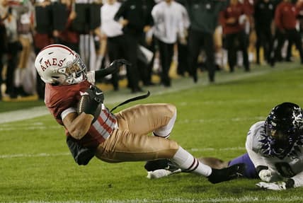Iowa State Cyclones' running back Eli Sanders (6) breaks a tackle from TCU Horned Frogs' linebacker Shad Banks jR.(0) and drives for a touchdown during the first half in the Jack Trice Legacy Game at Jack Trice Stadium on Saturday, Oct. 7, 2023, in Ames, Iowa.