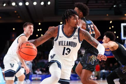 Nov 24, 2023; Paradise Island, BAHAMAS;  Villanova Wildcats guard Hakim Hart (13) drives to the basket past Memphis Tigers guard Jayden Hardaway (25) during the first half at Imperial Arena. Mandatory Credit: Kevin Jairaj-USA TODAY Sports