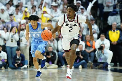Jan 17, 2024; Storrs, Connecticut, USA; Connecticut Huskies guard Tristen Newton (2) returns the ball against Creighton Bluejays guard Trey Alexander (23) in the second half at Harry A. Gampel Pavilion. Mandatory Credit: David Butler II-USA TODAY Sports