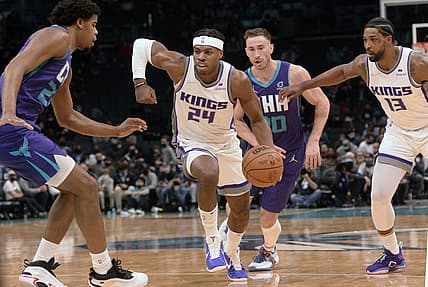 Dec 10, 2021; Charlotte, North Carolina, USA;  Sacramento Kings guard forward Buddy Hield (24) drives in during the first half against the Charlotte Hornets at the Spectrum Center. Mandatory Credit: Sam Sharpe-USA TODAY Sports
