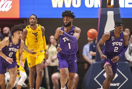 Mar 5, 2022; Morgantown, West Virginia, USA; TCU Horned Frogs guard Mike Miles (1) celebrates a made shot during the second half against the West Virginia Mountaineers at WVU Coliseum. Mandatory Credit: Ben Queen-USA TODAY Sports