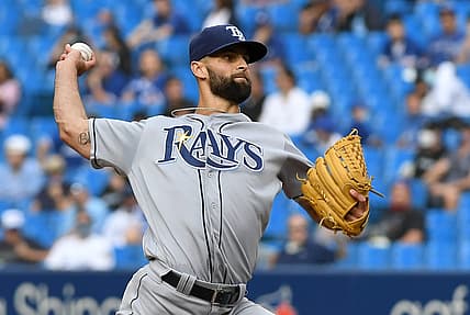 Sep 15, 2021; Toronto, Ontario, CAN;  Tampa Bay Rays relief pitcher Nick Anderson (70) delivers a pitch against Toronto Blue Jays in the eighth inning at Rogers Centre. Mandatory Credit: Dan Hamilton-USA TODAY Sports