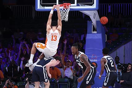 Nov 23, 2022; Paradise Island, BAHAMAS; Tennessee Volunteers forward Olivier Nkamhoua (13) dunks over Butler Bulldogs guard Simas Lukosius (41) during the second half at Imperial Arena. Mandatory Credit: Kevin Jairaj-USA TODAY Sports