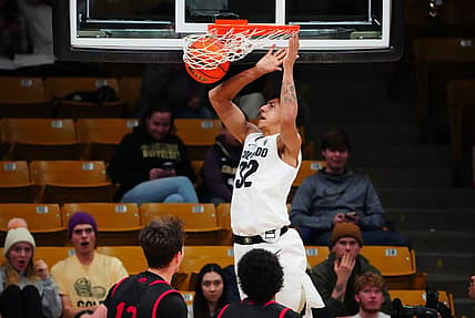 Dec 21, 2022; Boulder, Colorado, USA; Colorado Buffaloes guard Nique Clifford (32) dunks in the first half against the Southern Utah Thunderbirds at the CU Events Center. Mandatory Credit: Ron Chenoy-USA TODAY Sports