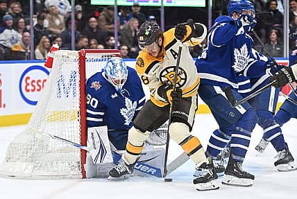 Dec 2, 2023; Toronto, Ontario, CAN; Toronto Maple Leafs goalie Joseph Woll (60) makes a save on a shot from Boston Bruins forward David Pastrnak (88) in the second period at Scotiabank Arena. Mandatory Credit: Dan Hamilton-USA TODAY Sports