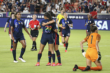 Jun 13, 2021; Houston, Texas, USA; United States defender Margaret Purce (20) celebrates her goal against Jamaica goalkeeper Sydney Schneider (1) in the first half during a WNT Summer Series international friendly soccer match at BBVA Stadium. Mandatory Credit: Thomas Shea-USA TODAY Sports