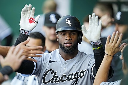 Sep 4, 2021; Kansas City, Missouri, USA; Chicago White Sox center fielder Luis Robert (88) is congratulated after hitting a home run against the Kansas City Royals during the first inning at Kauffman Stadium. Mandatory Credit: Jay Biggerstaff-USA TODAY Sports