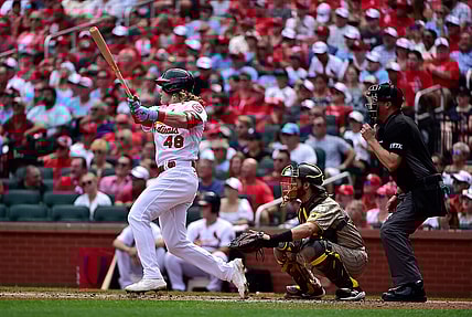 Sep 19, 2021; St. Louis, Missouri, USA;  St. Louis Cardinals center fielder Harrison Bader (48) hits a two run double during the first inning against the San Diego Padres at Busch Stadium. Mandatory Credit: Jeff Curry-USA TODAY Sports