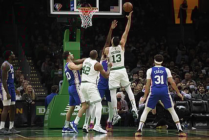 Dec 1, 2021; Boston, Massachusetts, USA;  Boston Celtics center Enes Freedom (13) shoots the ball during the first half against the Philadelphia 76ers at TD Garden. Mandatory Credit: Bob DeChiara-USA TODAY Sports