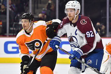 Dec 6, 2021; Philadelphia, Pennsylvania, USA; Colorado Avalanche left wing Gabriel Landeskog (92) and Philadelphia Flyers defenseman Justin Braun (61) battle for position during the second period at Wells Fargo Center. Mandatory Credit: Eric Hartline-USA TODAY Sports