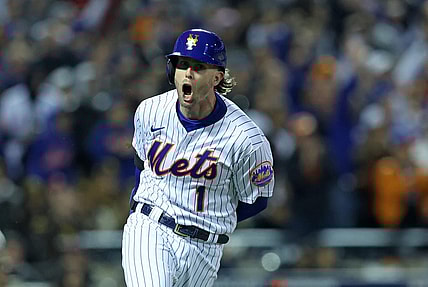Oct 8, 2022; New York City, New York, USA; New York Mets second baseman Jeff McNeil (1) reacts after hitting a two run double against the San Diego Padres in the seventh inning during game two of the Wild Card series for the 2022 MLB Playoffs at Citi Field. Mandatory Credit: Brad Penner-USA TODAY Sports