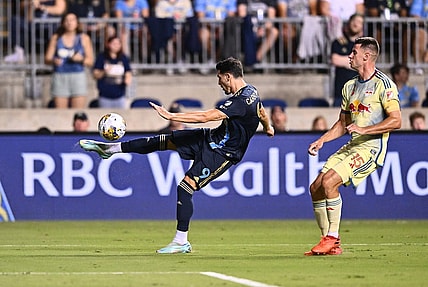 Sep 3, 2023; Philadelphia, Pennsylvania, USA; Philadelphia Union forward Julian Carranza (9) passes the ball against New York Red Bulls defender Sean Nealis (15) in the first half at Subaru Park. Mandatory Credit: Kyle Ross-USA TODAY Sports