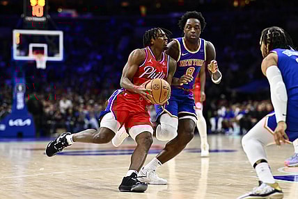Jan 5, 2024; Philadelphia, Pennsylvania, USA; Philadelphia 76ers guard Tyrese Maxey (0) drives against New York Knicks forward OG Anunoby (8) in the fourth quarter at Wells Fargo Center. Mandatory Credit: Kyle Ross-USA TODAY Sports