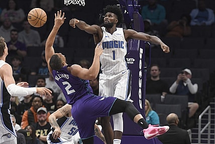 Mar 5, 2024; Charlotte, North Carolina, USA;  Orlando Magic forward Jonathan Isaac (1) defends against Charlotte Hornets forward Grant Williams (2) during the first half at the Spectrum Center. Mandatory Credit: Sam Sharpe-USA TODAY Sports
