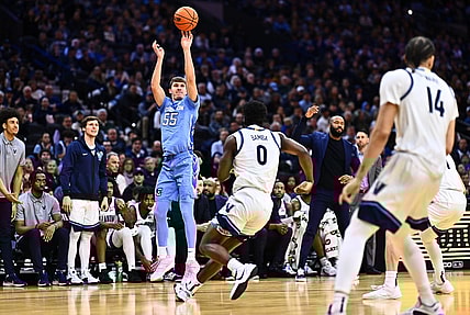 Mar 9, 2024; Philadelphia, Pennsylvania, USA; Creighton Bluejays guard Baylor Scheierman (55) shoots over Villanova Wildcats guard TJ Bamba (0) in the first half at Wells Fargo Center. Mandatory Credit: Kyle Ross-USA TODAY Sports