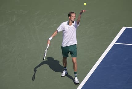 Aug 20, 2021; Mason, OH, USA; Daniil Medvedev (RUS) tosses the ball to serve during his match against Pablo Carreno Busta (ESP not pictured) during the Western and Southern Open at the Lindner Family Tennis Center. Mandatory Credit: Susan Mullane-USA TODAY Sports