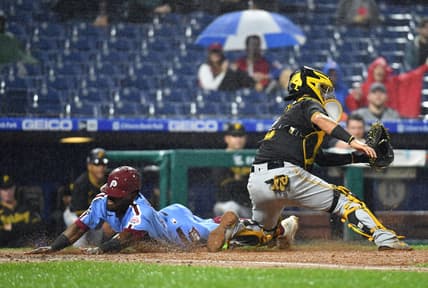 Sep 23, 2021; Philadelphia, Pennsylvania, USA; Philadelphia Phillies center fielder Odubel Herrera (37) slides safely into home past Pittsburgh Pirates catcher Michael Perez (5) during the third inning at Citizens Bank Park. Mandatory Credit: Eric Hartline-USA TODAY Sports