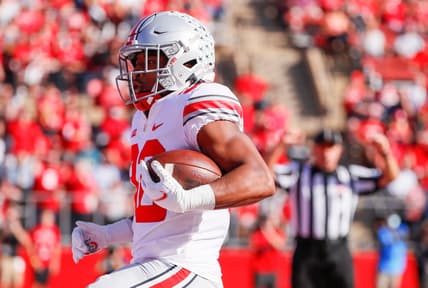 Ohio State Buckeyes running back TreVeyon Henderson (32) races into the end zone for a touchdown during the first quarter of a NCAA Division I football game between the Rutgers Scarlet Knights and the Ohio State Buckeyes on Saturday, Oct. 2, 2021 at SHI Stadium in Piscataway, New Jersey.

Cfb Ohio State Buckeyes At Rutgers Scarlet Knights