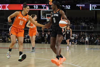 Jul 10, 2022; Chicago, Ill, USA; Team Wilson guard Kelsey Plum (10) defends Team Stewart guard Jackie Young (0) during the first half in a WNBA All Star Game at Wintrust Arena. Mandatory Credit: David Banks-USA TODAY Sports